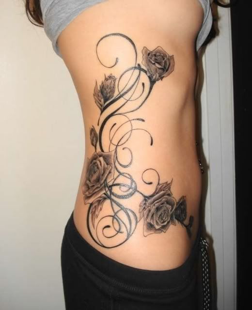 Tattoos Mania chest rose girl tattoo