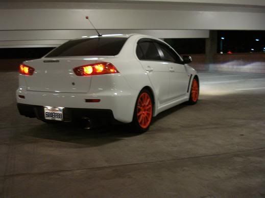 man u should have left the spoiler on there and orange rims on white not my