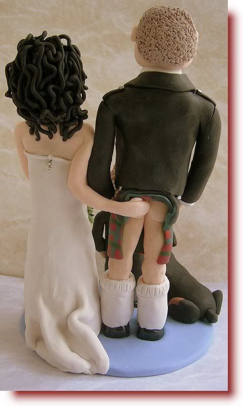 Bride and groom funny wedding cake toppers.